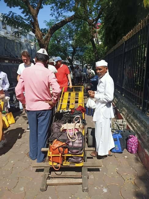 Best Combo Tour: Dabbawalas, Dhobi Ghat and Slum with Train - Dhobi Ghat: The World’s Largest Outdoor Laundry in Concrete Troughs