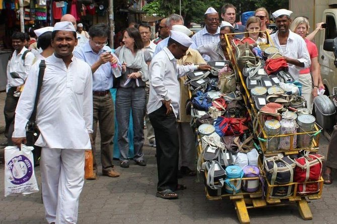 Dabbawala, Dhobi Ghat & Dharavi slum Tour with Local Train Ride - Churchgate to Dharavi by local train: the easiest way to feel the city