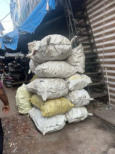 Dharavi Slum Tour - Price and value: $8 with entry fees, guide, and transport