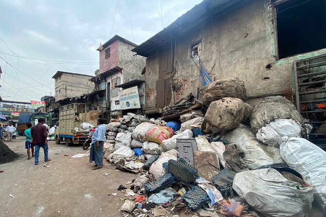 Dharavi Slum tour in Mumbai by local resident - Skin drying area: a serious look at materials work