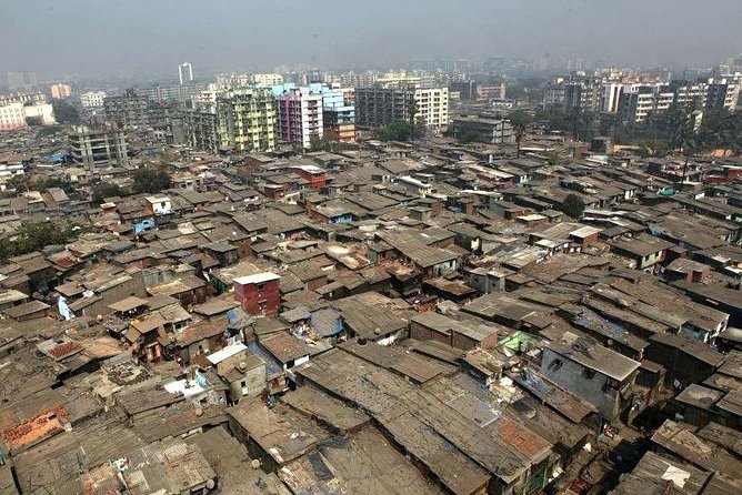 Dharavi Slumdog Millionaire Tour - Walking through industries: plastic, leather, dye, pottery