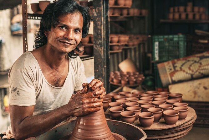 Dharavi Tour & Pottery Workshop - The short community stop: learning how funds are re-invested