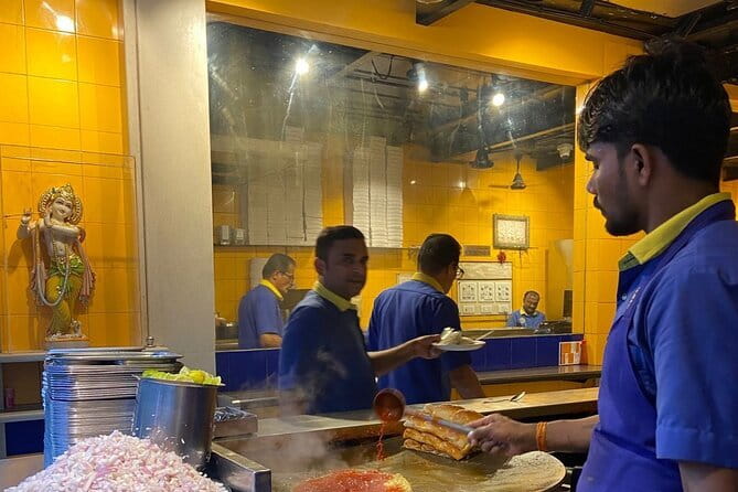 Flavors of Mumbai Food Tour - First tasting on a train: snacks with sunset views