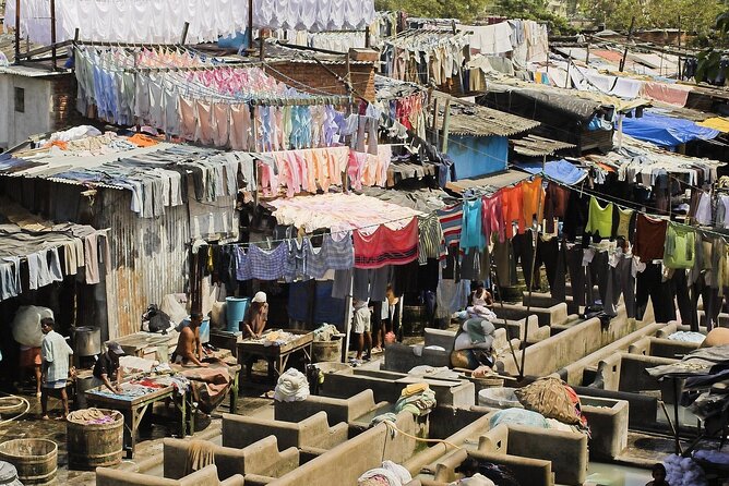 Full Day Mumbai City Tour and Dharavi Slums - Gandhi at Mani Bhavan, plus the Train-Station Landmark: Chhatrapati Shivaji Terminus