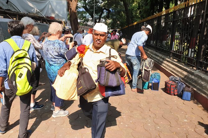Mumbai City + Dabbawala aka Lunchbox + Train Ride Tour - The Unfeigned Mumbai. - Hotel pickup, air-conditioned comfort, and a mobile ticket