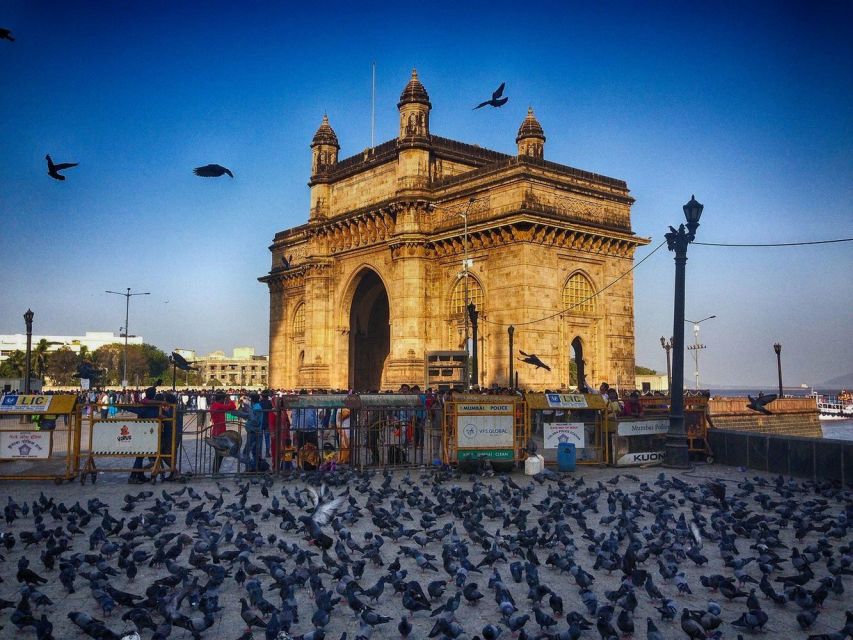 Mumbai: City Tour, Elephanta Caves, Dharavi Slum W/Options - Gateway of India, Taj views, and CST: your fast track to Mumbai’s big symbols