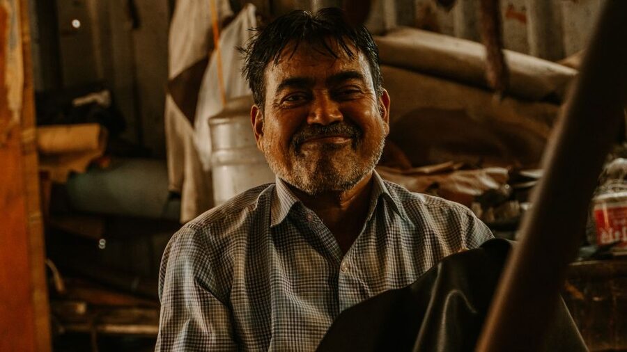 Mumbai: Dharavi Slum Walking Tour by First Female Tour Guide - Beyond recycling: soap factories, cloth, leather, pottery