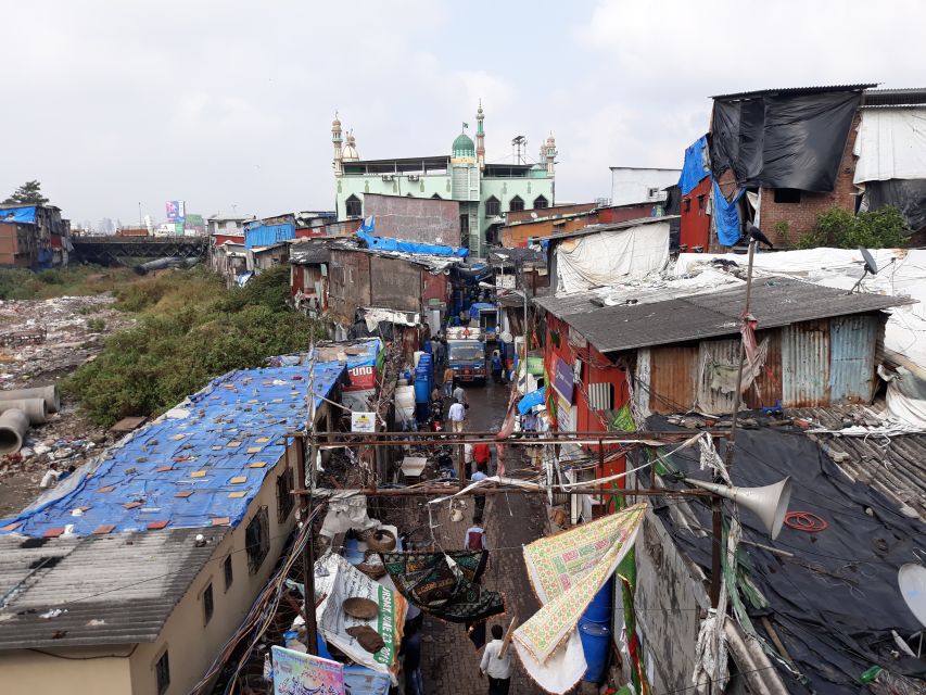 Mumbai: Dharavi Slum Walking Tour with Local Slum Dweller - Market Area, Schools, Hospitals, and Houses Off the Main Streets