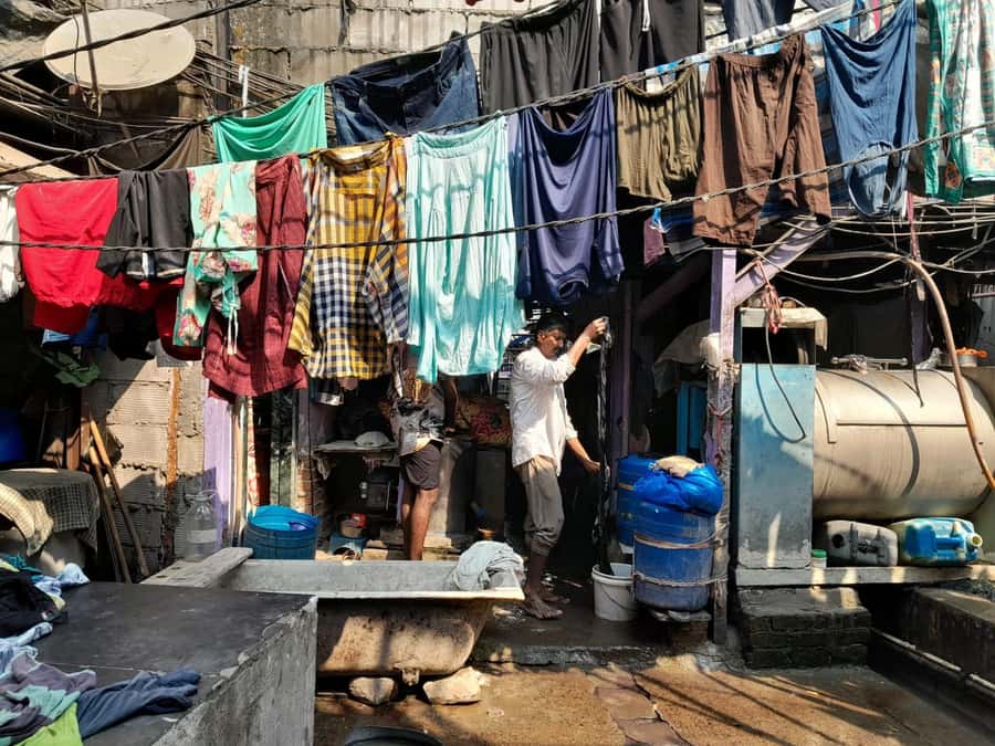 Mumbai:Dhobi Ghat Laundry,Dharavi Slum & Flower market Tour - From Churchgate to Dhobi Ghat: riding the city on purpose