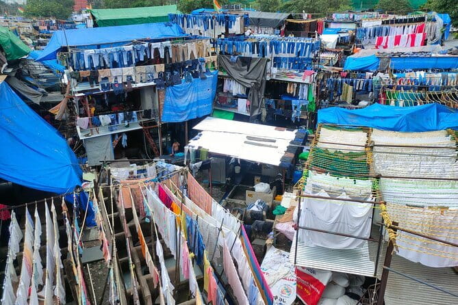 Mumbai: Dhobi Ghat Laundry & Dharavi Slum Tour with a Local - Dharavi with a local: daily life, work, and Slumdog filming locations