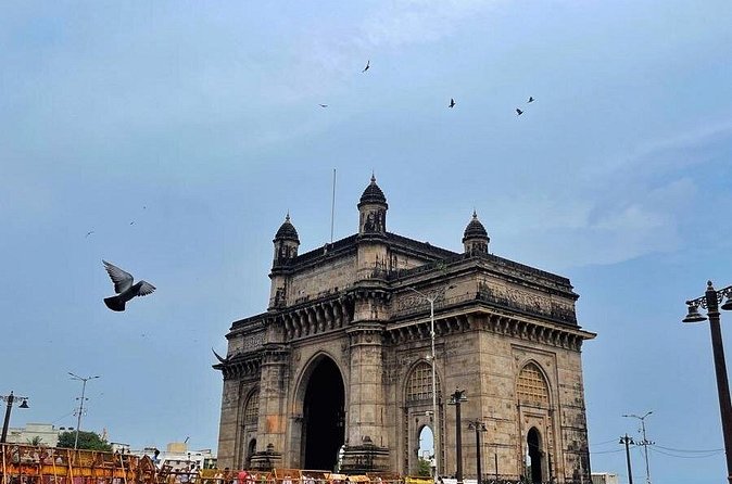 Mumbai Sightseeing Tour - Central Mumbai Identity: University of Mumbai, Rajabai Clock Tower, MCGM, and Crawford Market