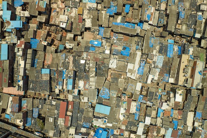 Private Dharavi Slum Photography Tour With Pickup - Entering Dharavi as a Neighborhood, Not a Stereotype