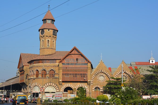 Two Days Mumbai Tour Package : City + Slum + Elephanta + Market - Gandhi, laundries, and the UNESCO station rush: CST, Mani Bhavan, Dhobi Ghat